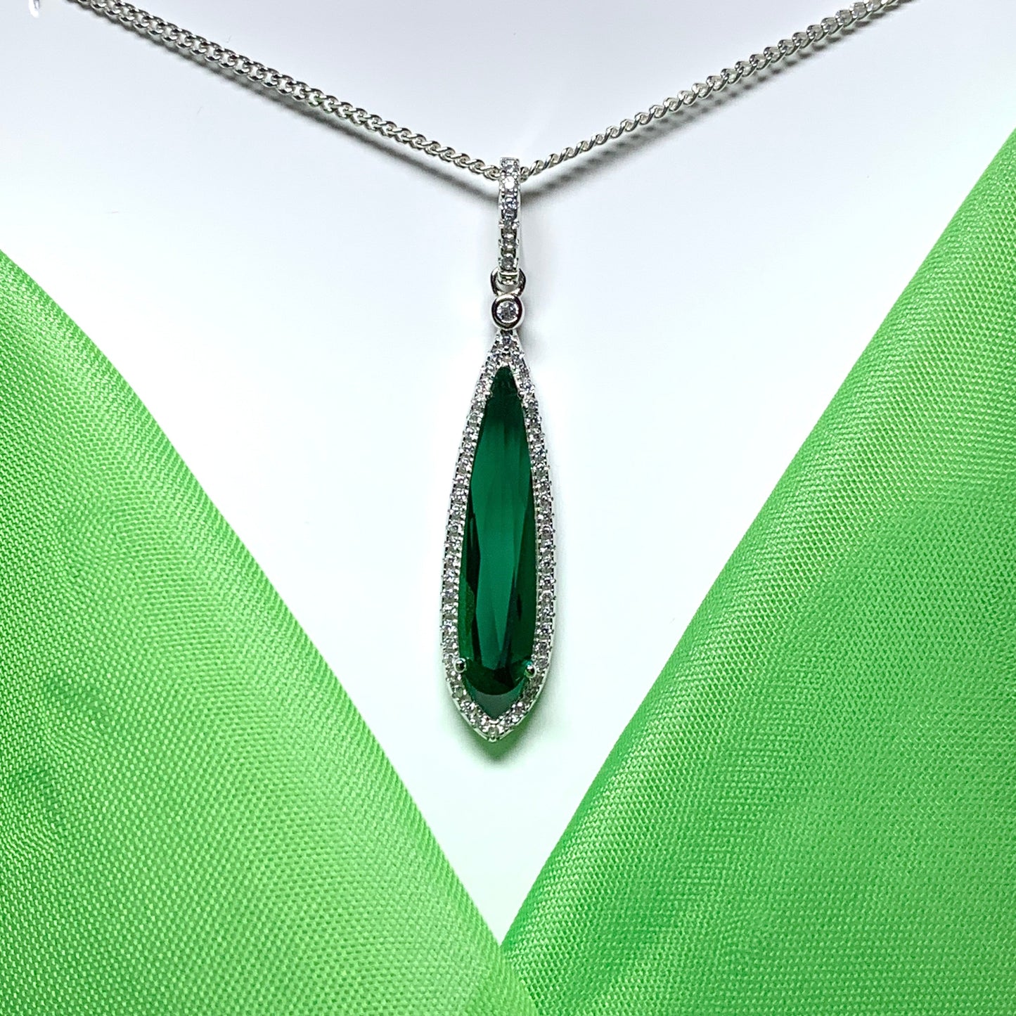 Green pear shaped cubic zirconia silver cluster long drop necklace pendant