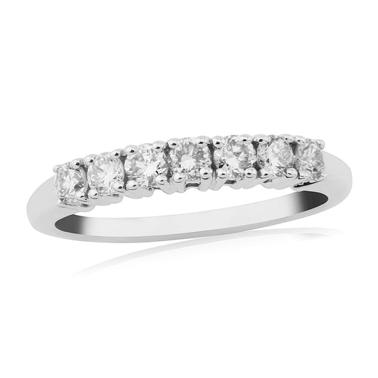 Platinum half carat diamond eternity ring, having seven round cut diamonds Inside a clawed setting