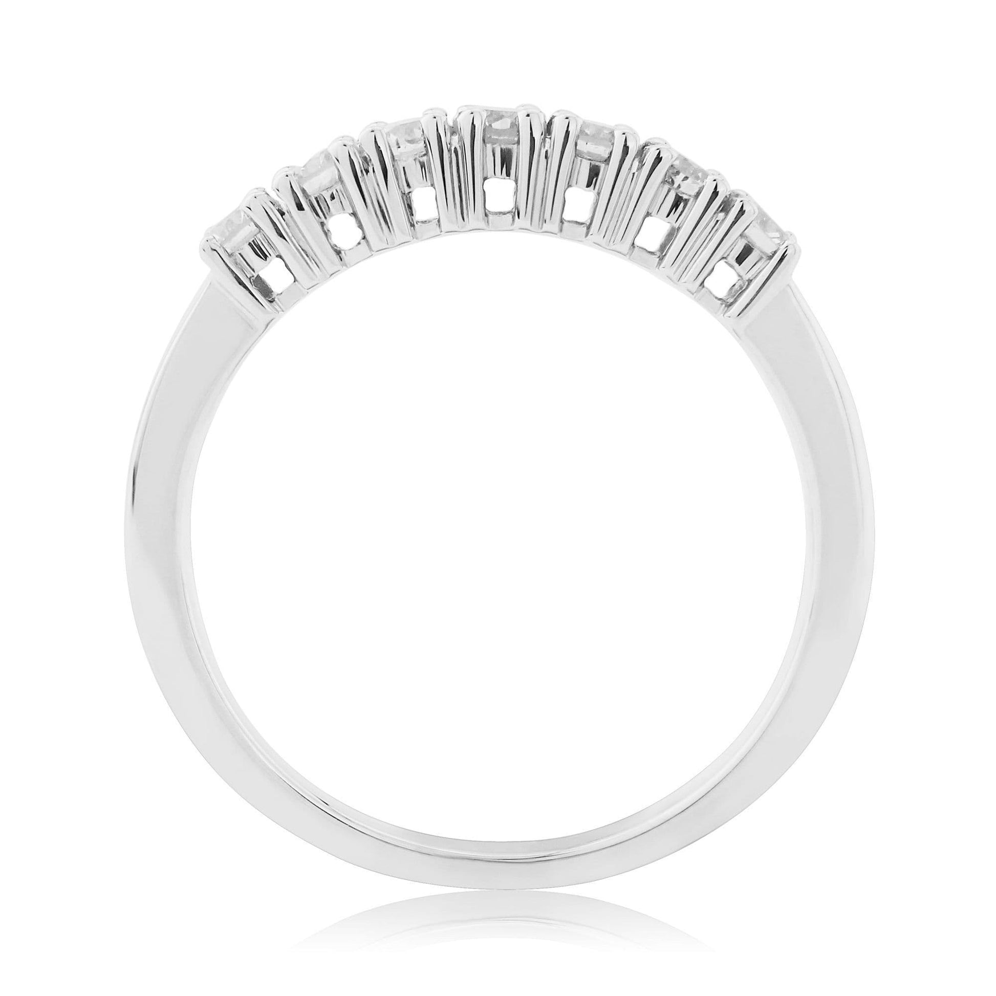 Platinum half carat diamond eternity ring With a simple clawed setting