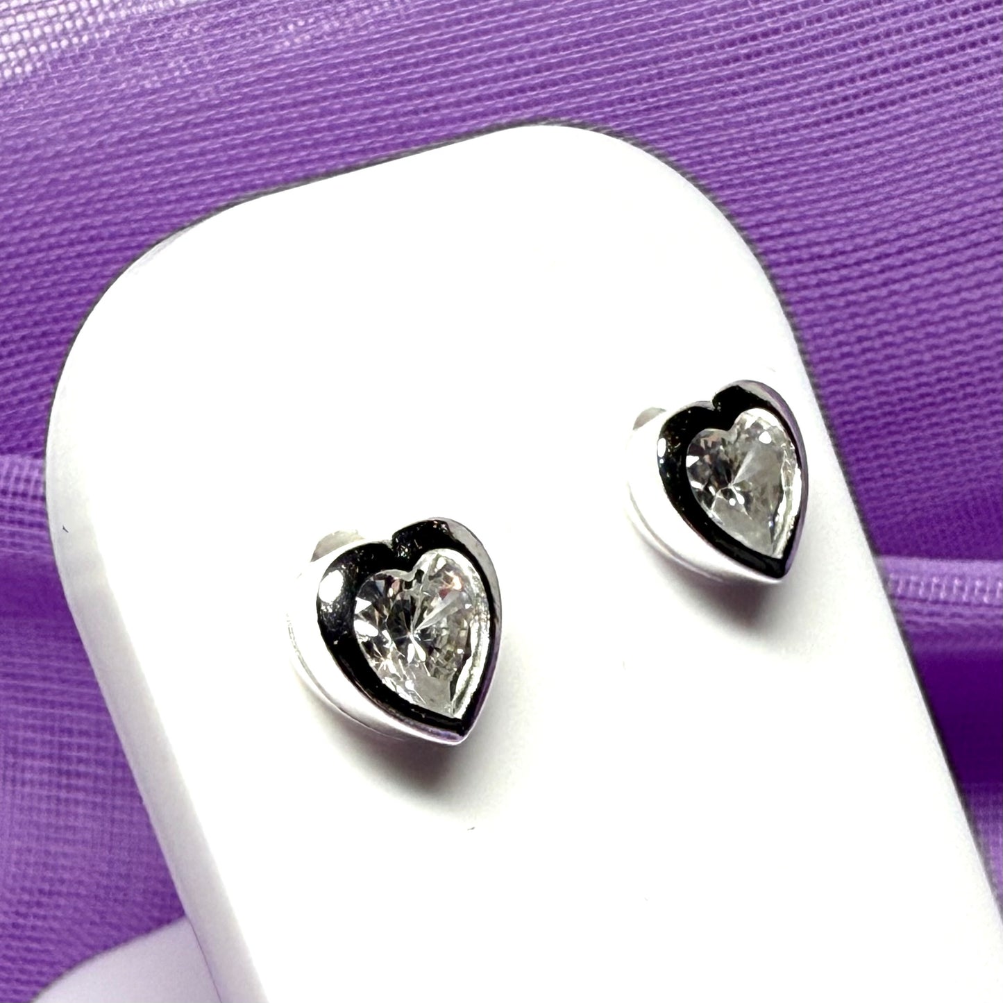 Heart shaped sparkling cubic zirconia sterling silver stud earrings