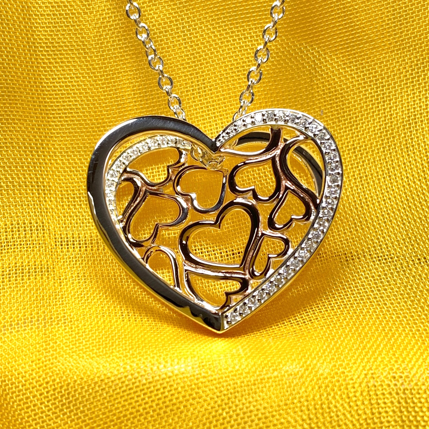 Heart shaped necklace sterling silver with rose gold gilt