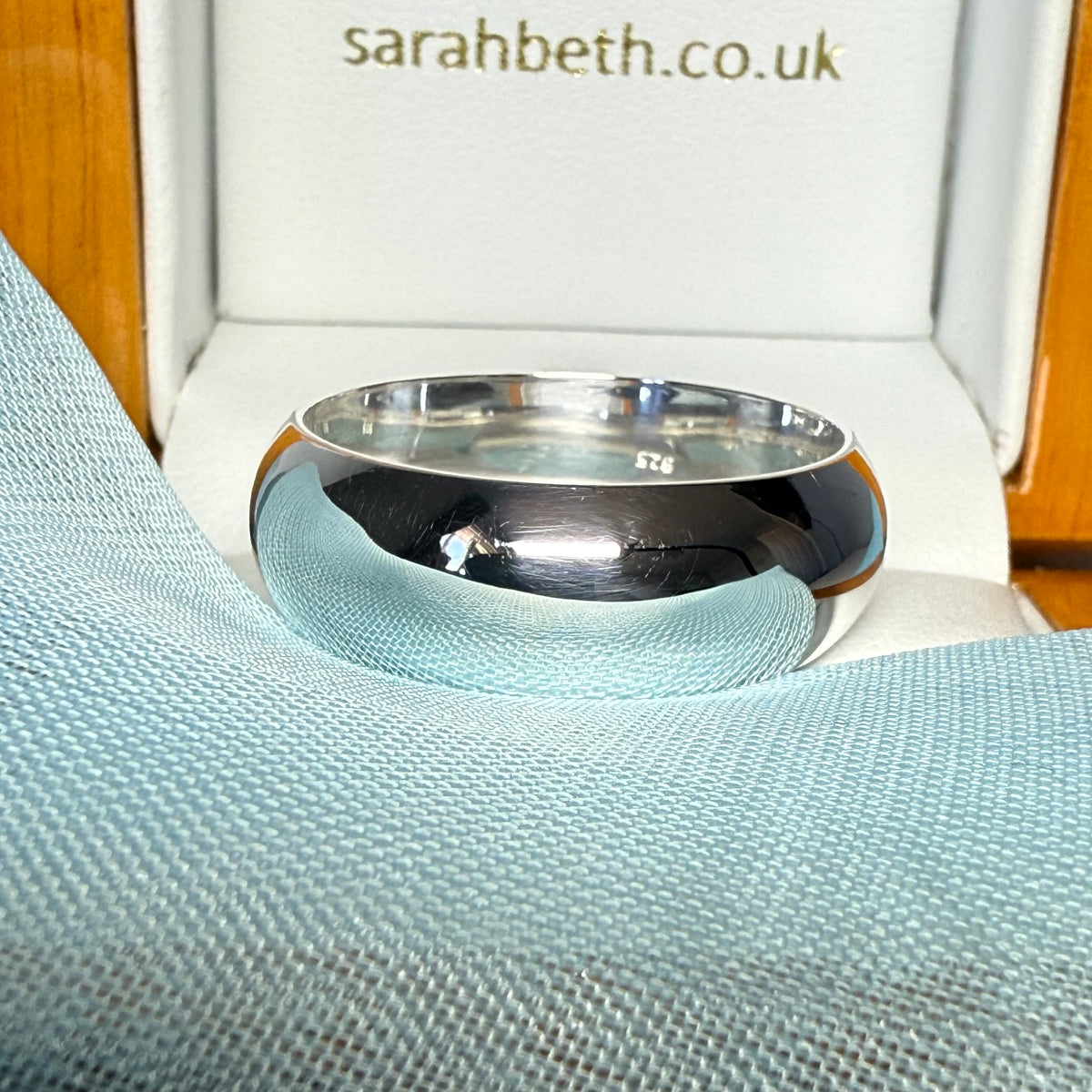 Heavy polished plain sterling silver men's wedding ring 8 mm wide rounded