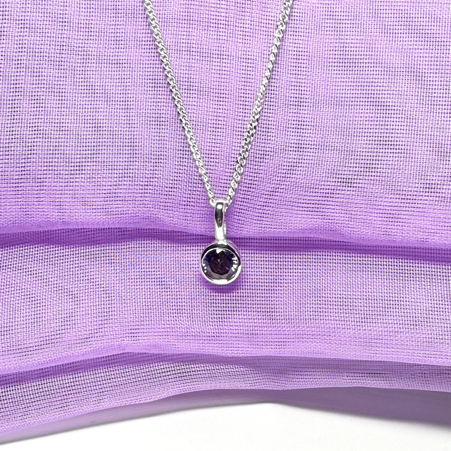 Real purple amethyst round sterling silver necklace with a smooth rubbed over pendant