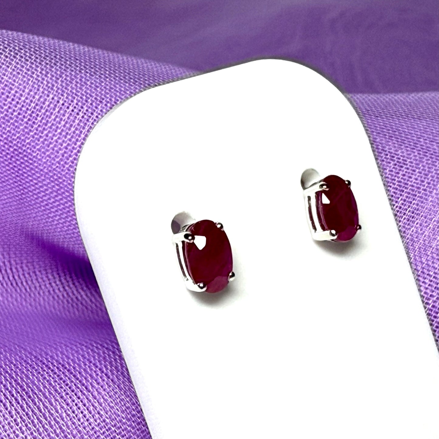 Real red ruby white gold stud earrings oval in shape