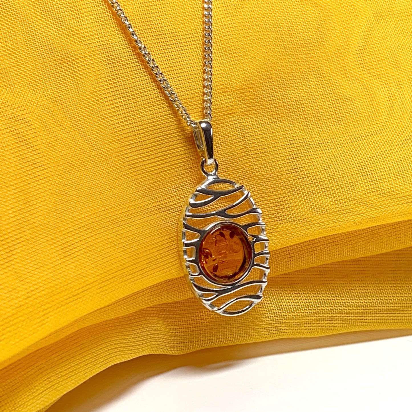 Orange real amber necklace oval open drop pierced pendant sterling silver