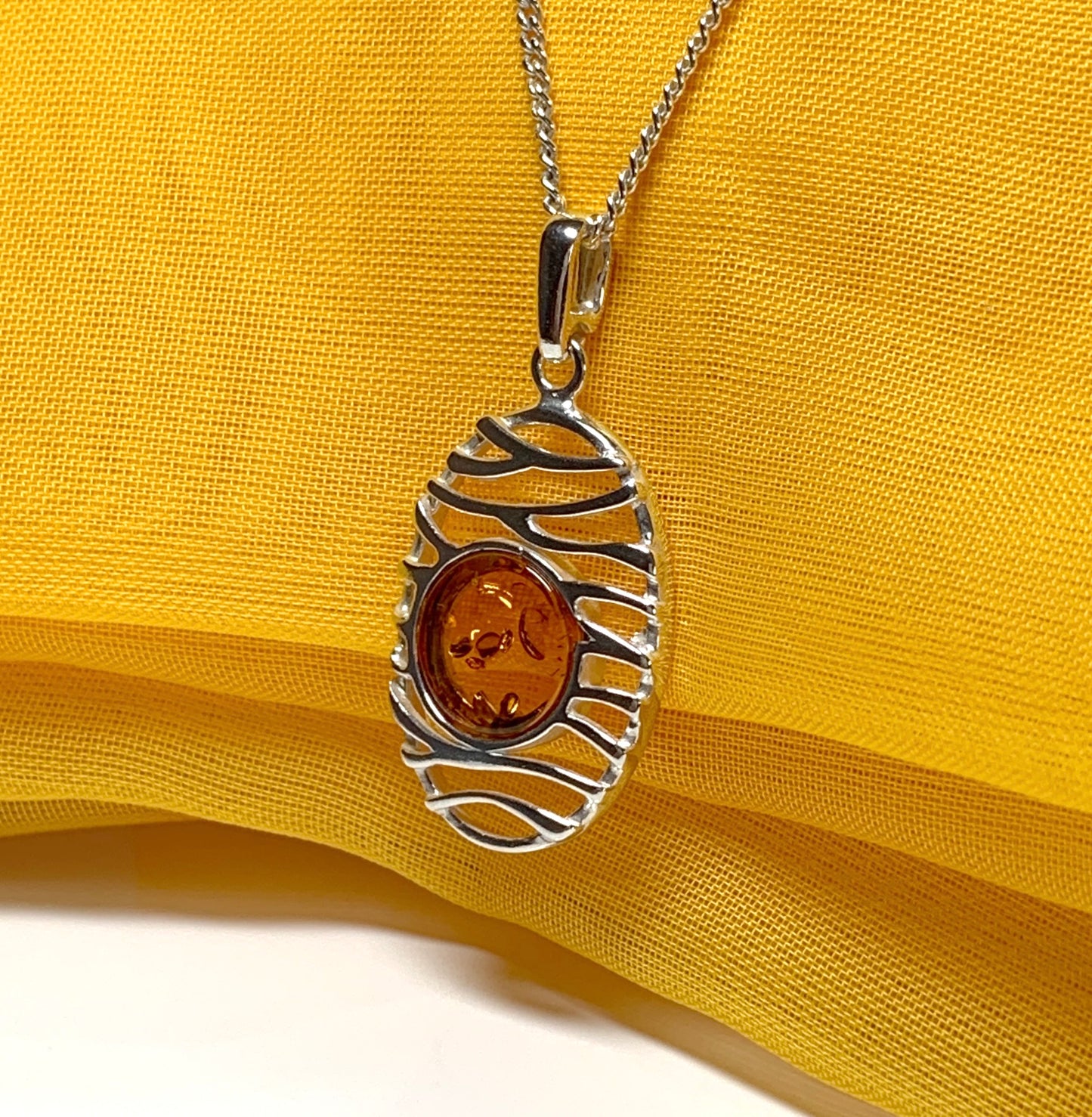 Orange real amber necklace oval open drop pierced pendant sterling silver