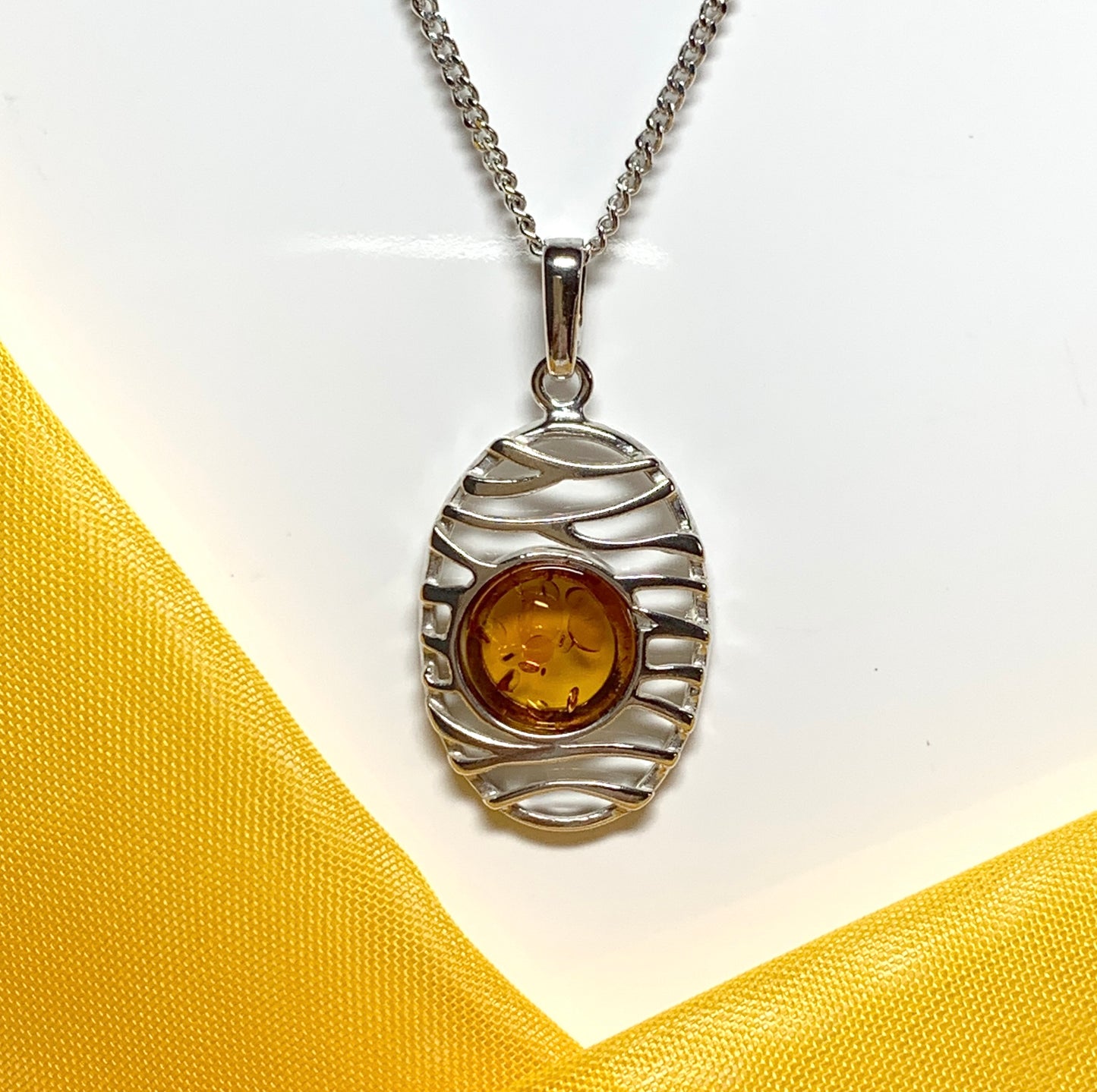 Orange real amber necklace oval open drop pierced pendant sterling silver