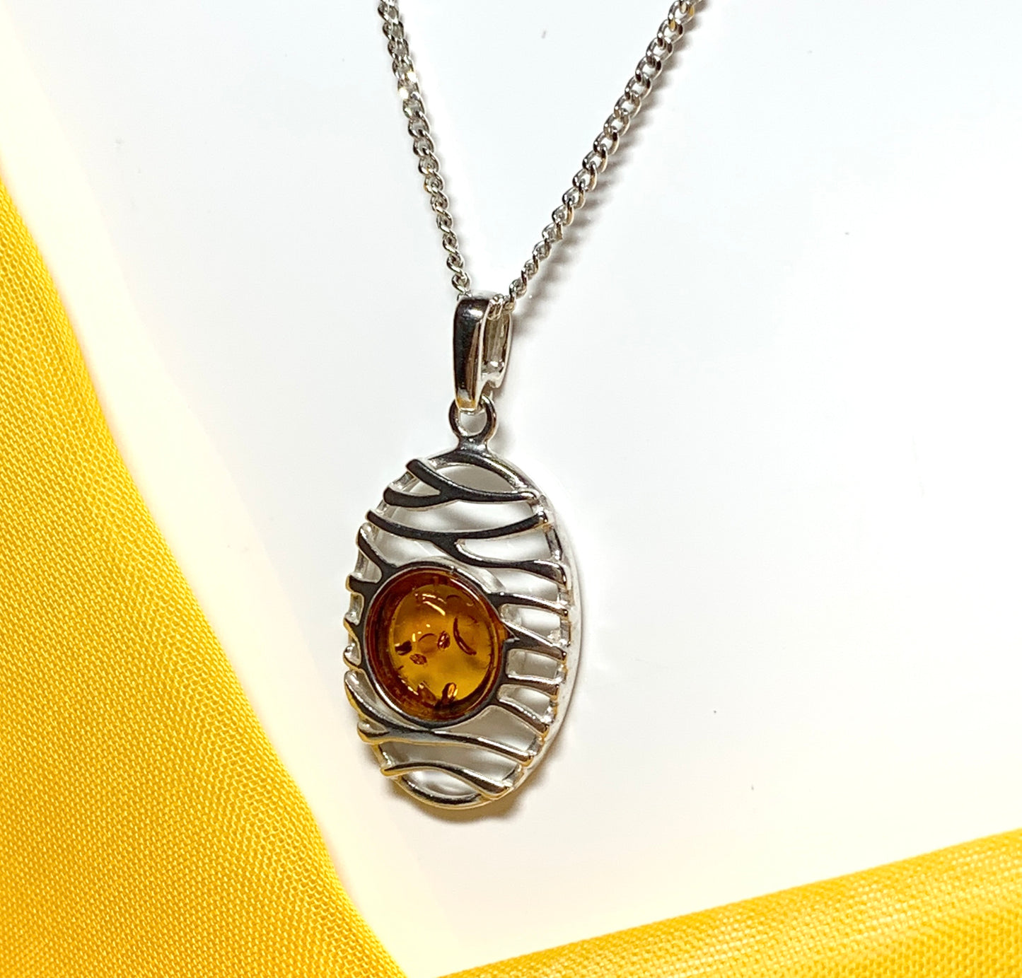 Orange real amber necklace oval open drop pierced pendant sterling silver