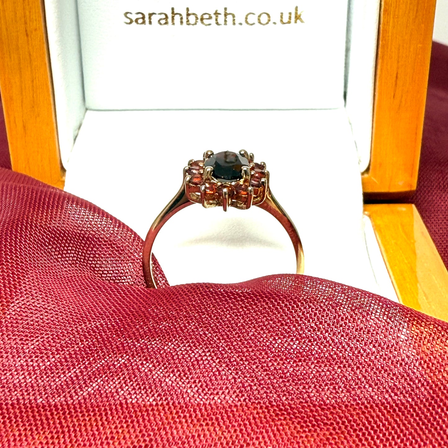 Oval real garnet cluster ring yellow gold