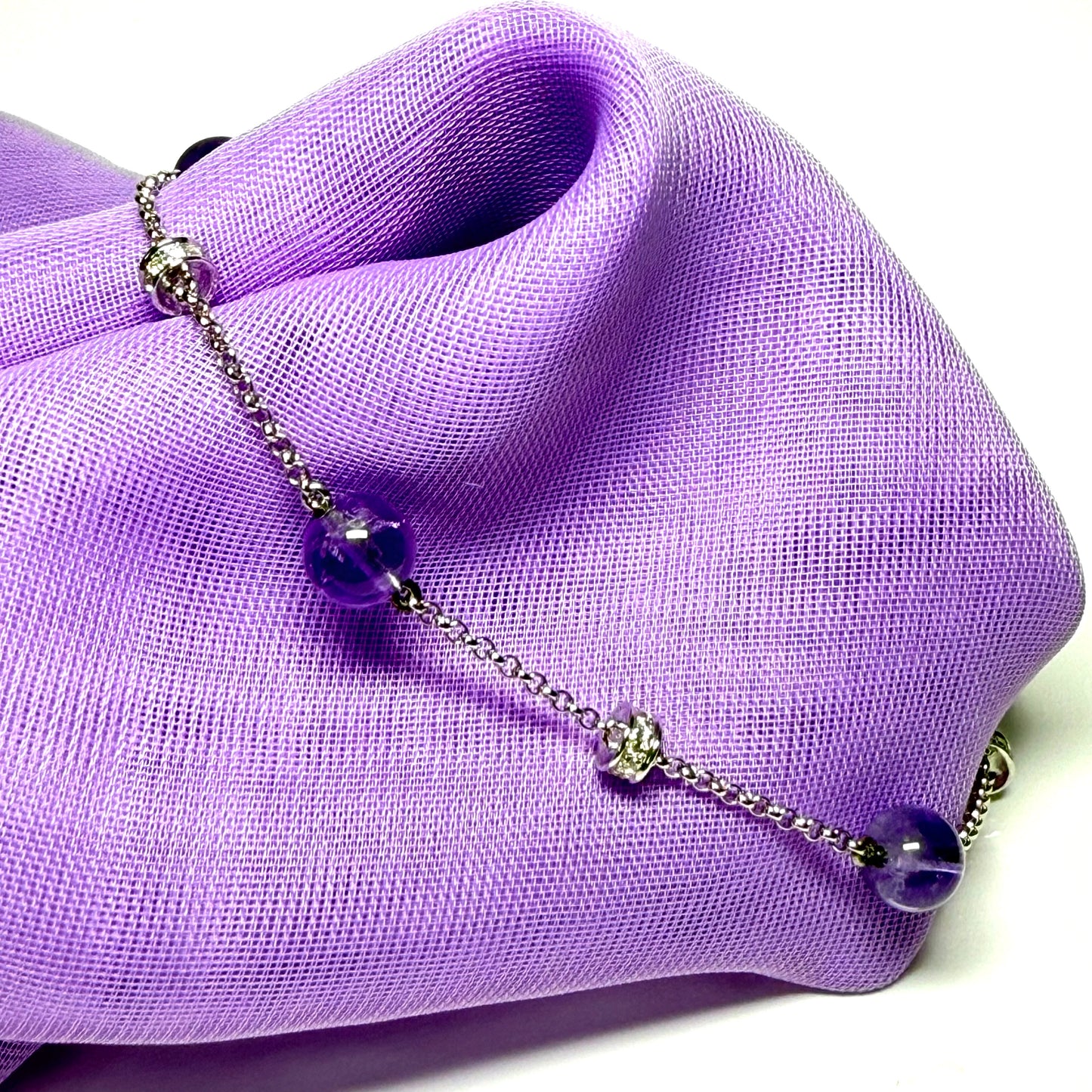 Real amethyst and cubic zirconia round sterling silver bracelet