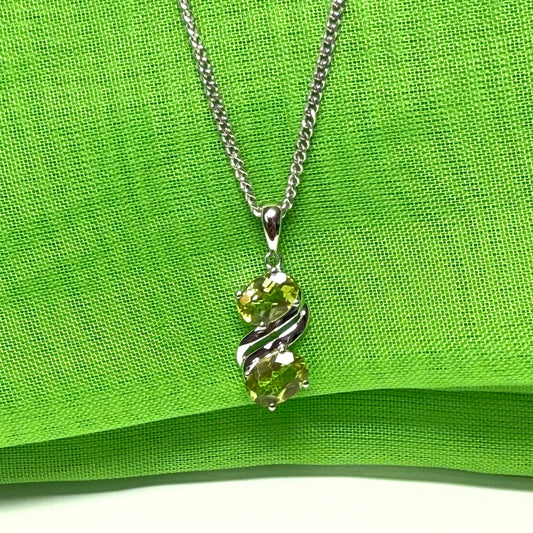Real green peridot necklace fancy double swirl oval stones including a chain