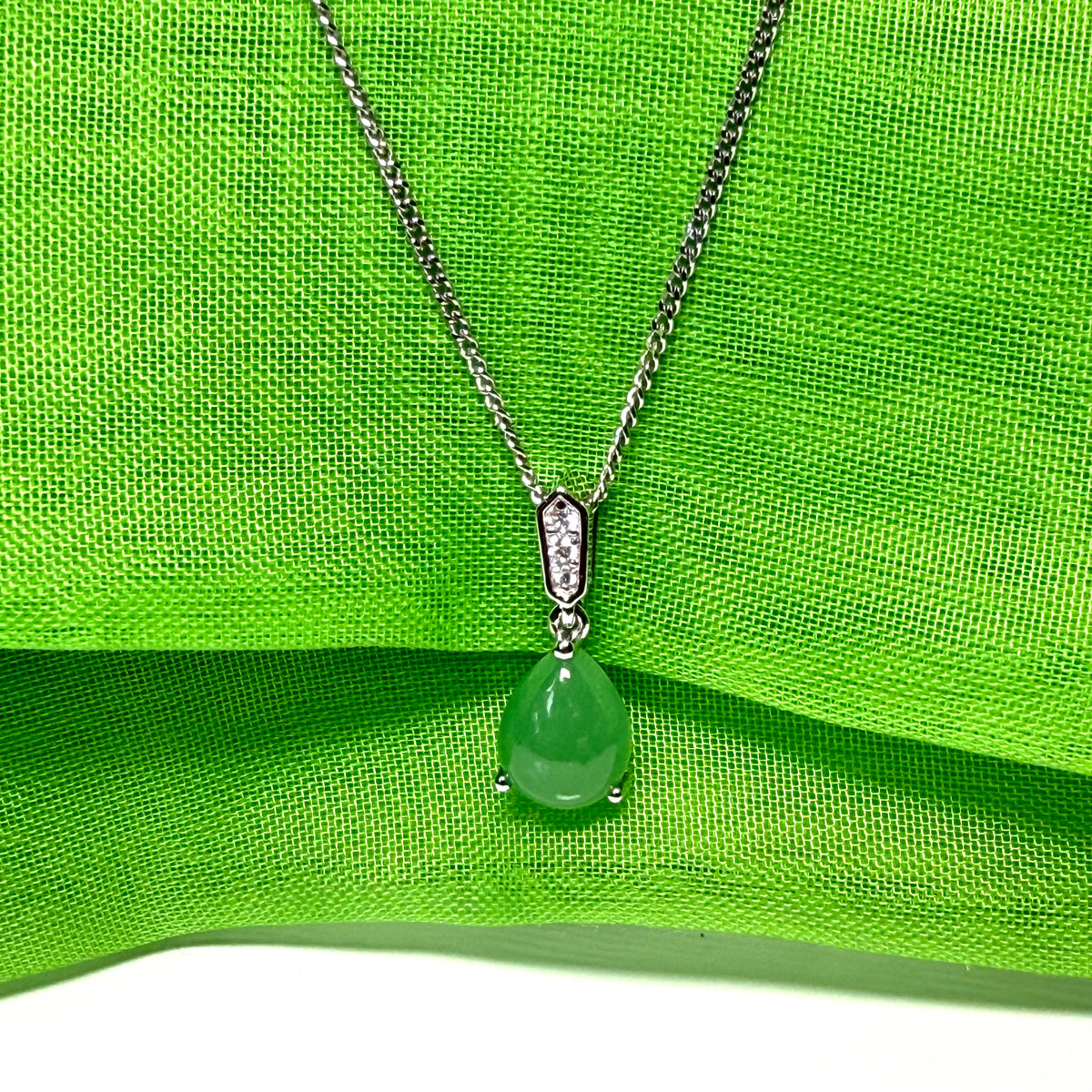 Real green pear teardrop jade and diamond white gold necklace