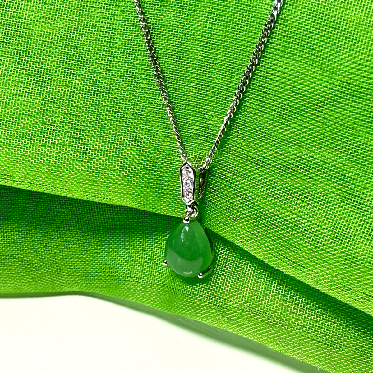 Real green pear teardrop jade and diamond white gold necklace