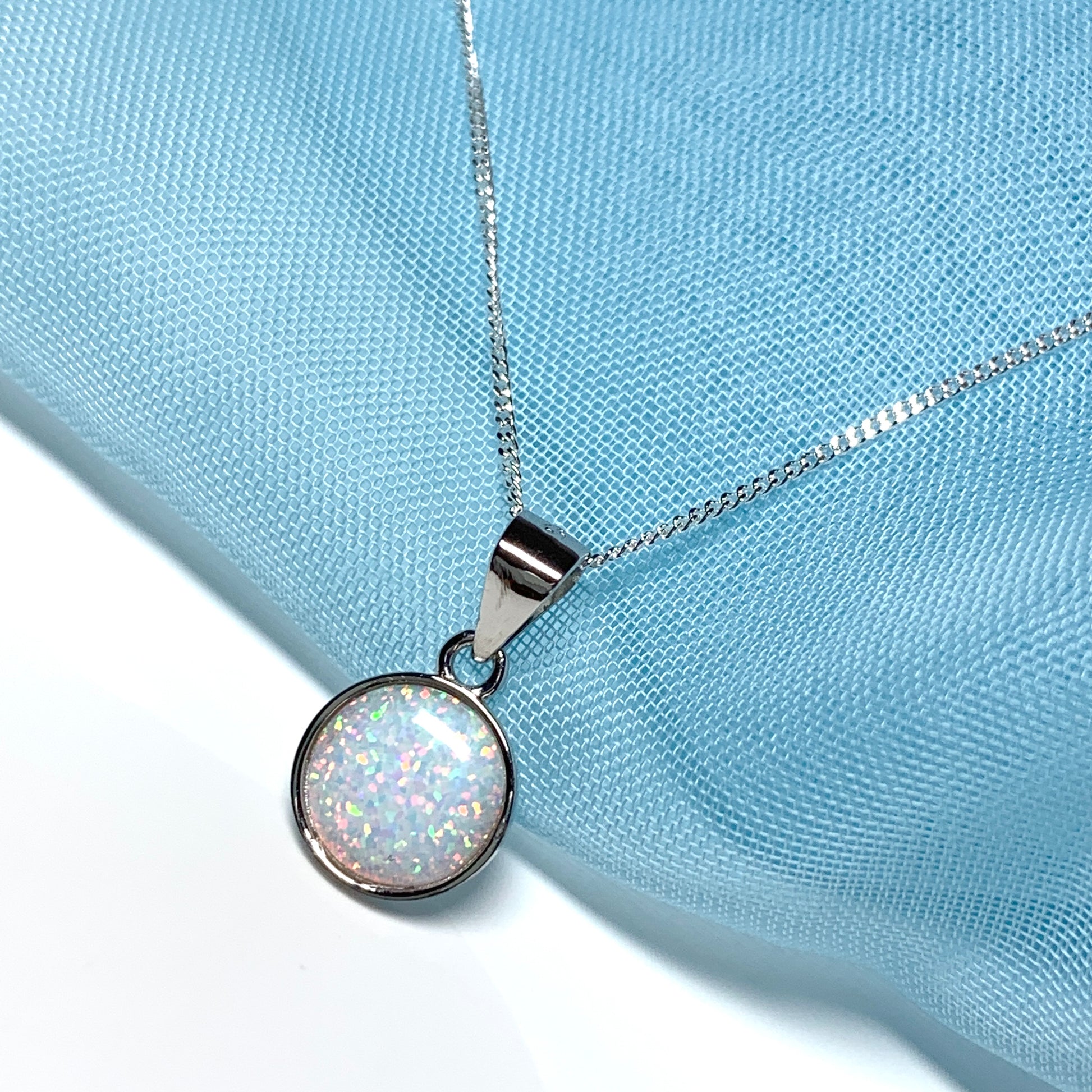 Sterling silver round opal rubbed over necklace