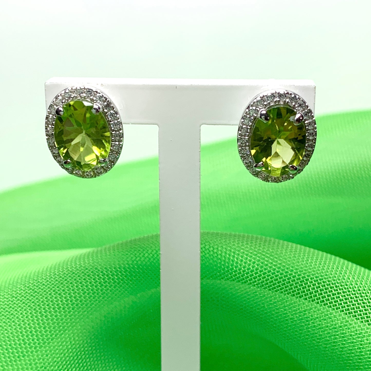 Real peridot and diamond stud earrings oval sterling silver