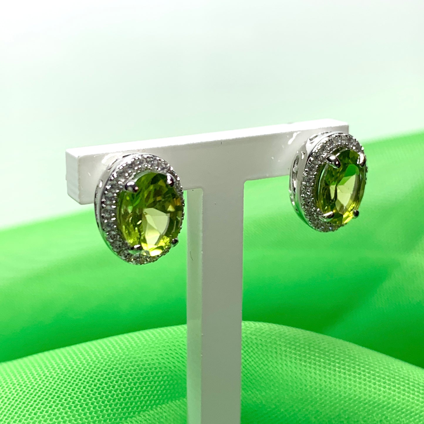 Real peridot and diamond stud earrings oval sterling silver