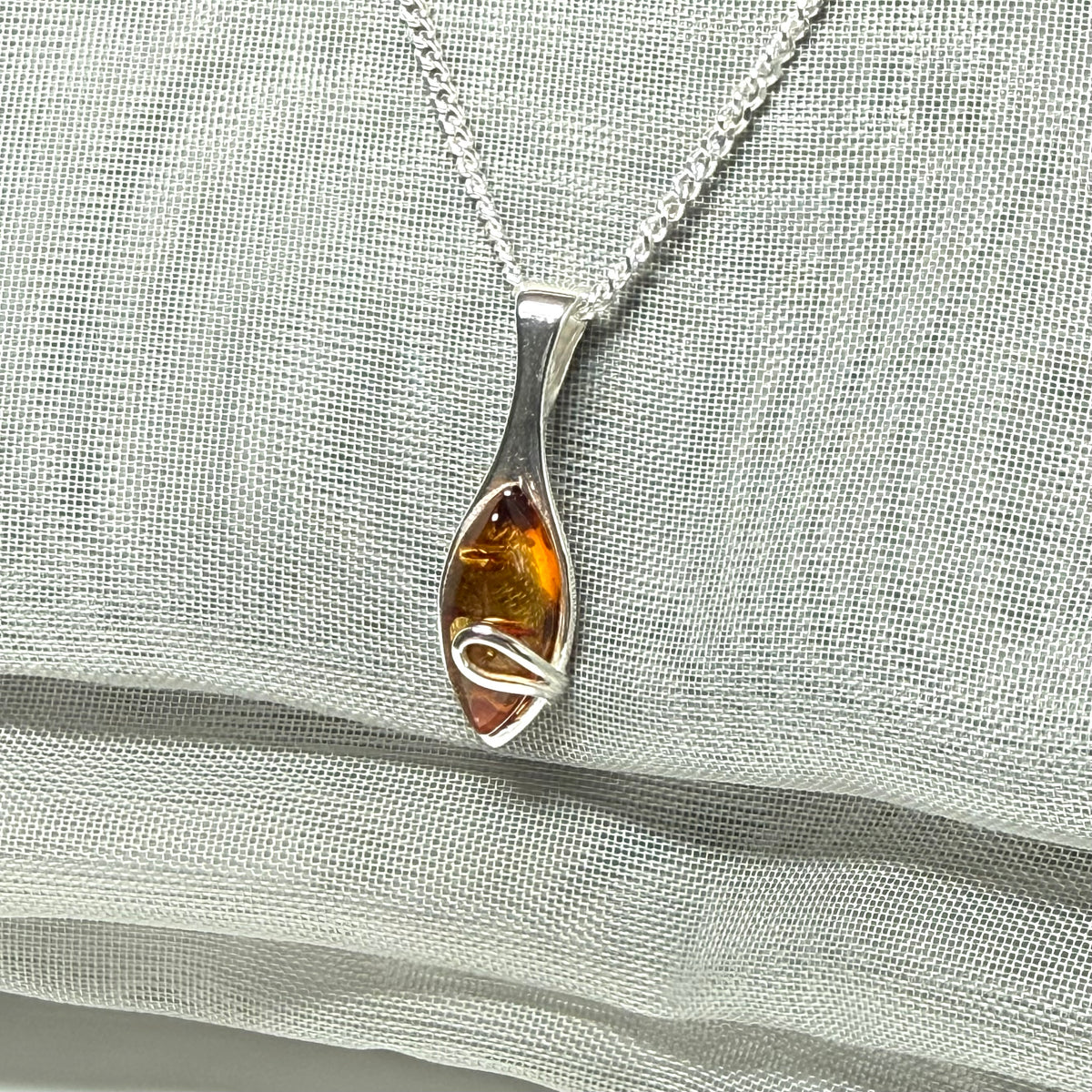 Sterling silver real amber marquise shape necklace swirl pendant