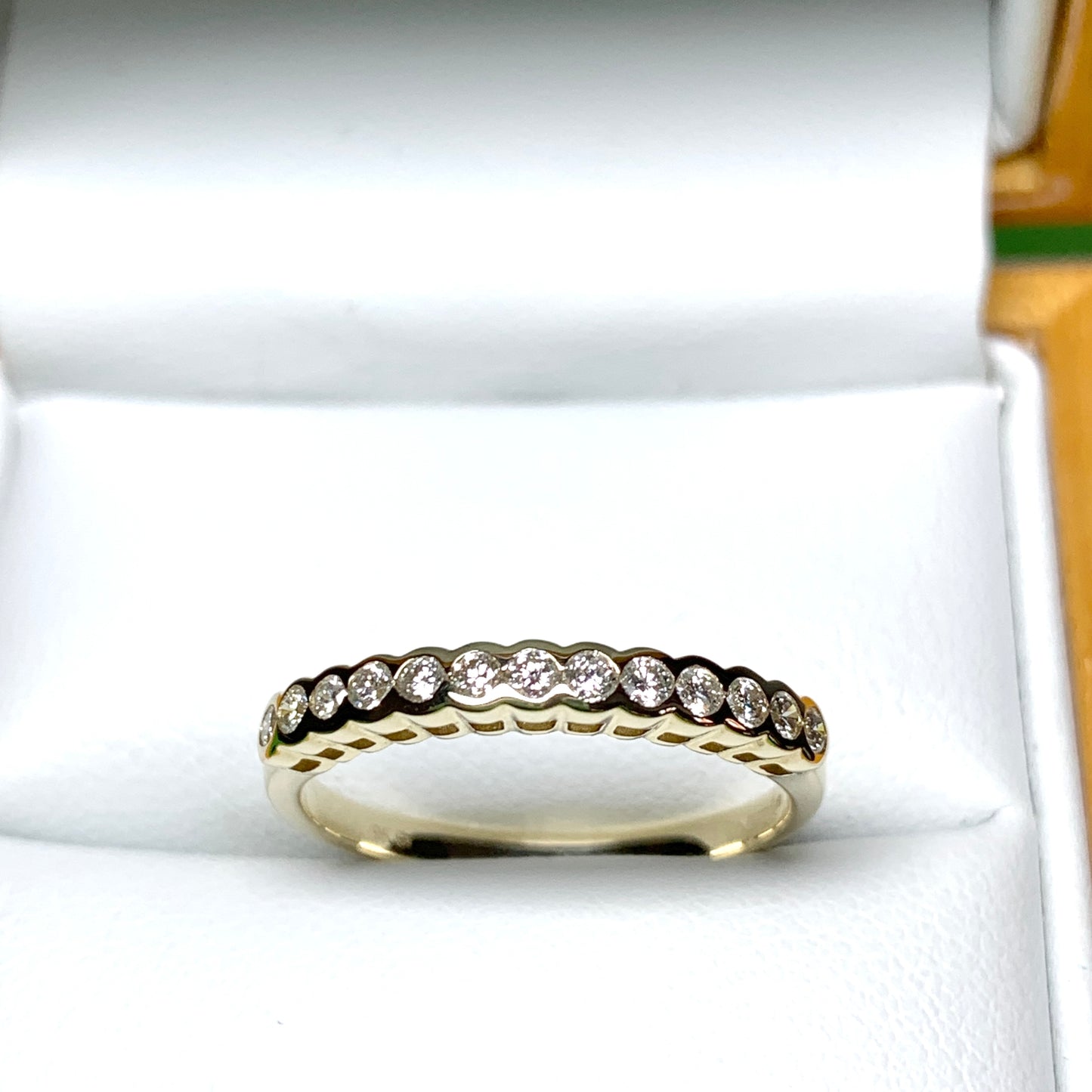 Diamond eternity ring yellow gold smooth rubbed over setting 28 points