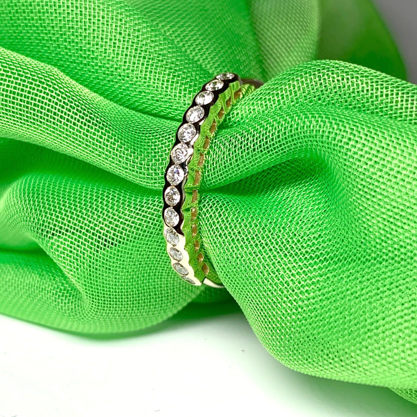 Diamond eternity ring yellow gold smooth rubbed over setting 28 points