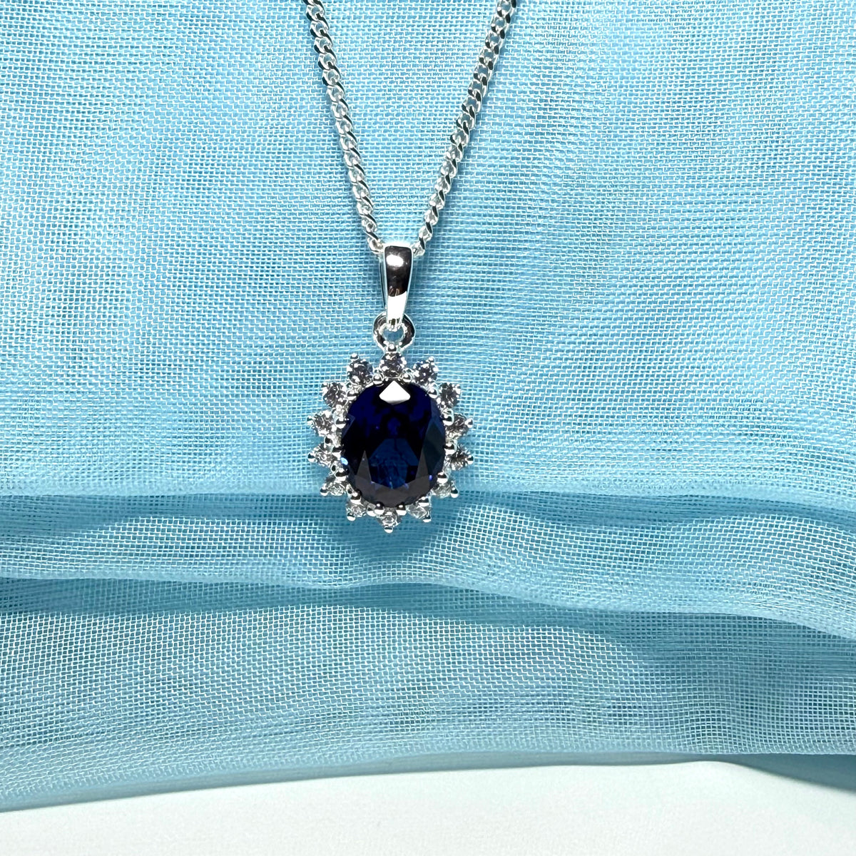 Large necklace deep sapphire blue white cubic zirconia oval cluster