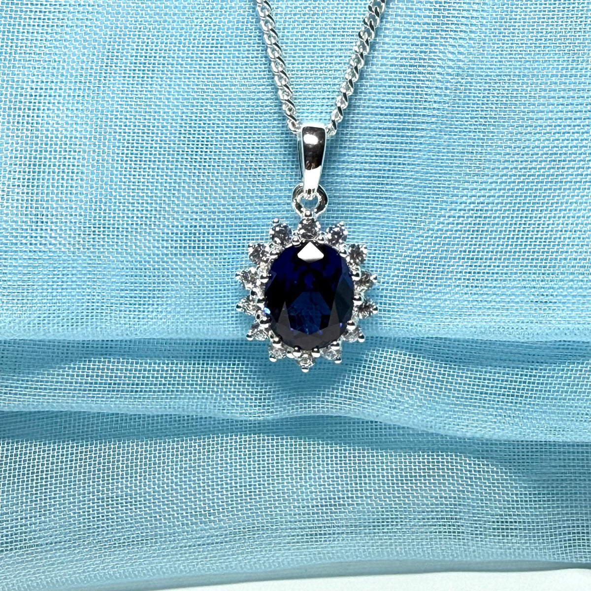 Large necklace deep sapphire blue white cubic zirconia oval cluster
