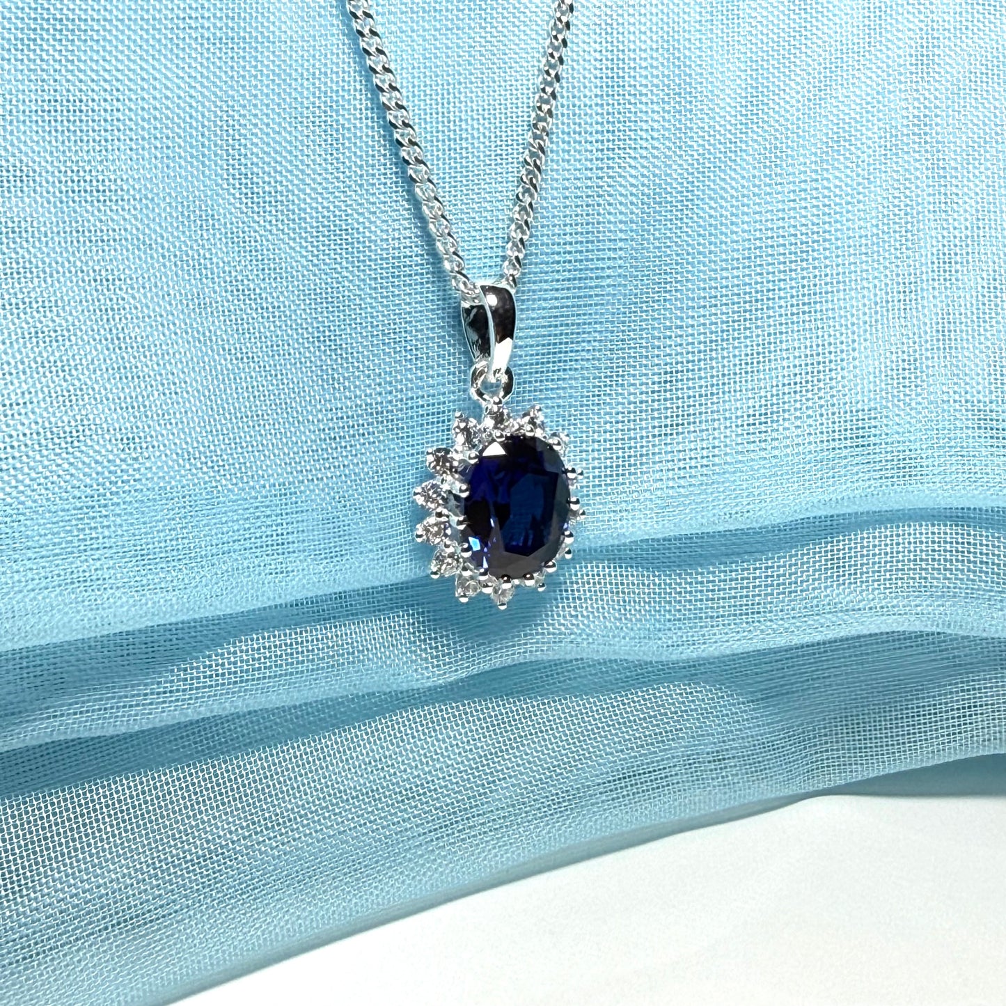 Large necklace deep sapphire blue white cubic zirconia oval cluster