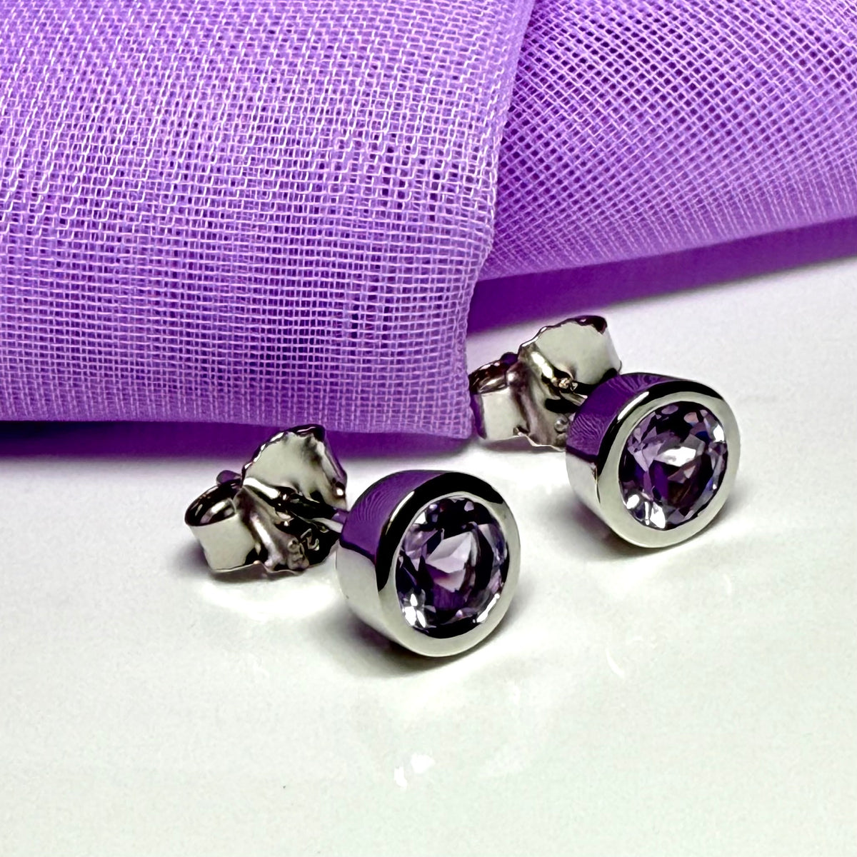 Real purple round amethyst stud earrings smooth rubbed over edges