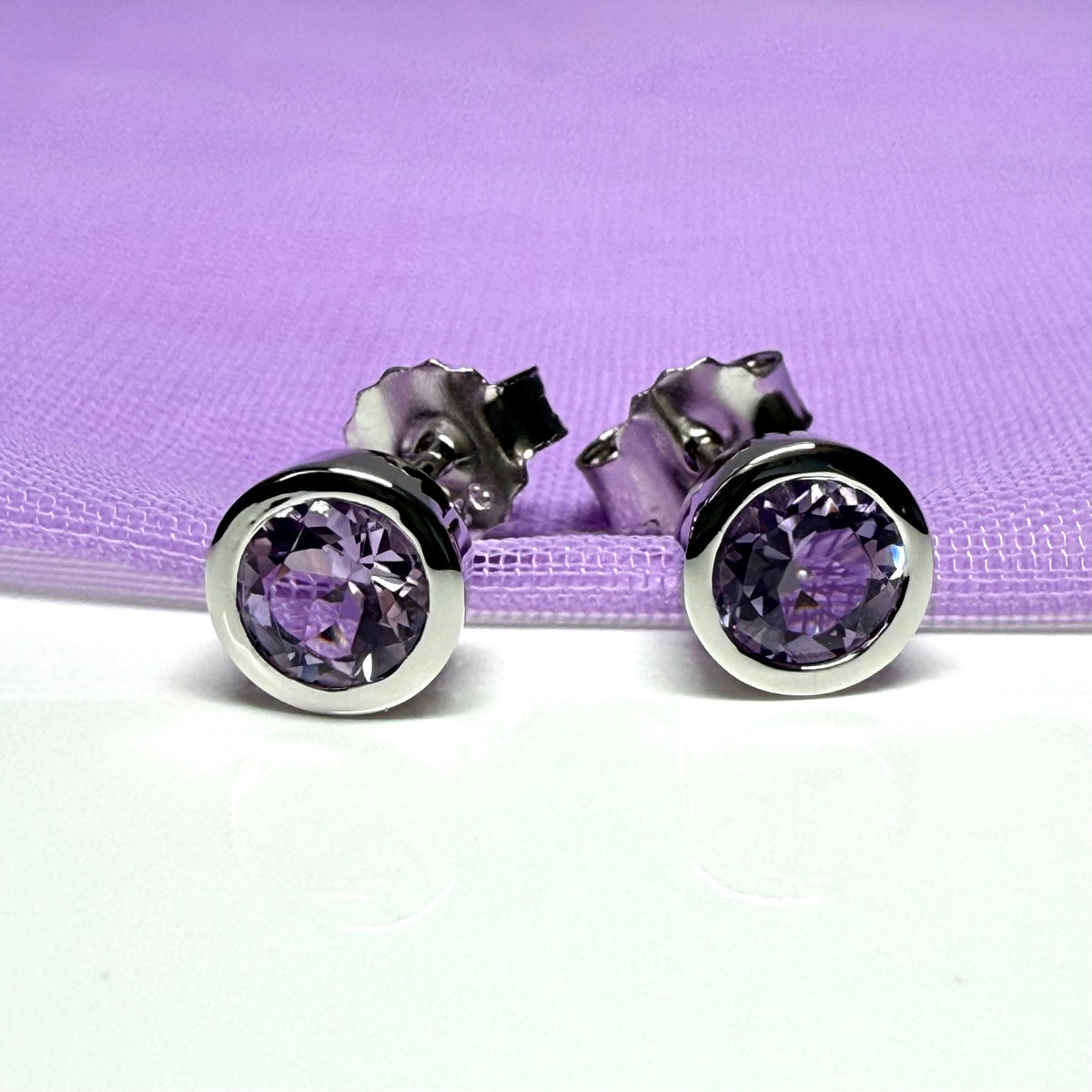 Real purple round amethyst stud earrings smooth rubbed over edges