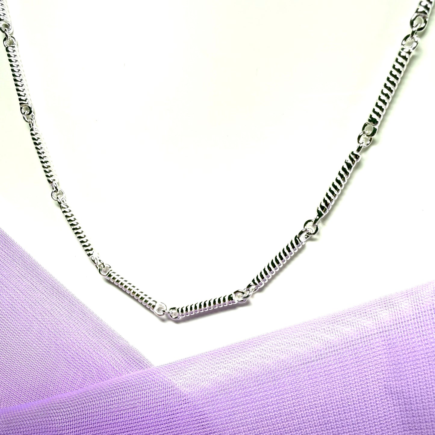 Ladies sterling silver long scrolled twisted patterned necklace solid links