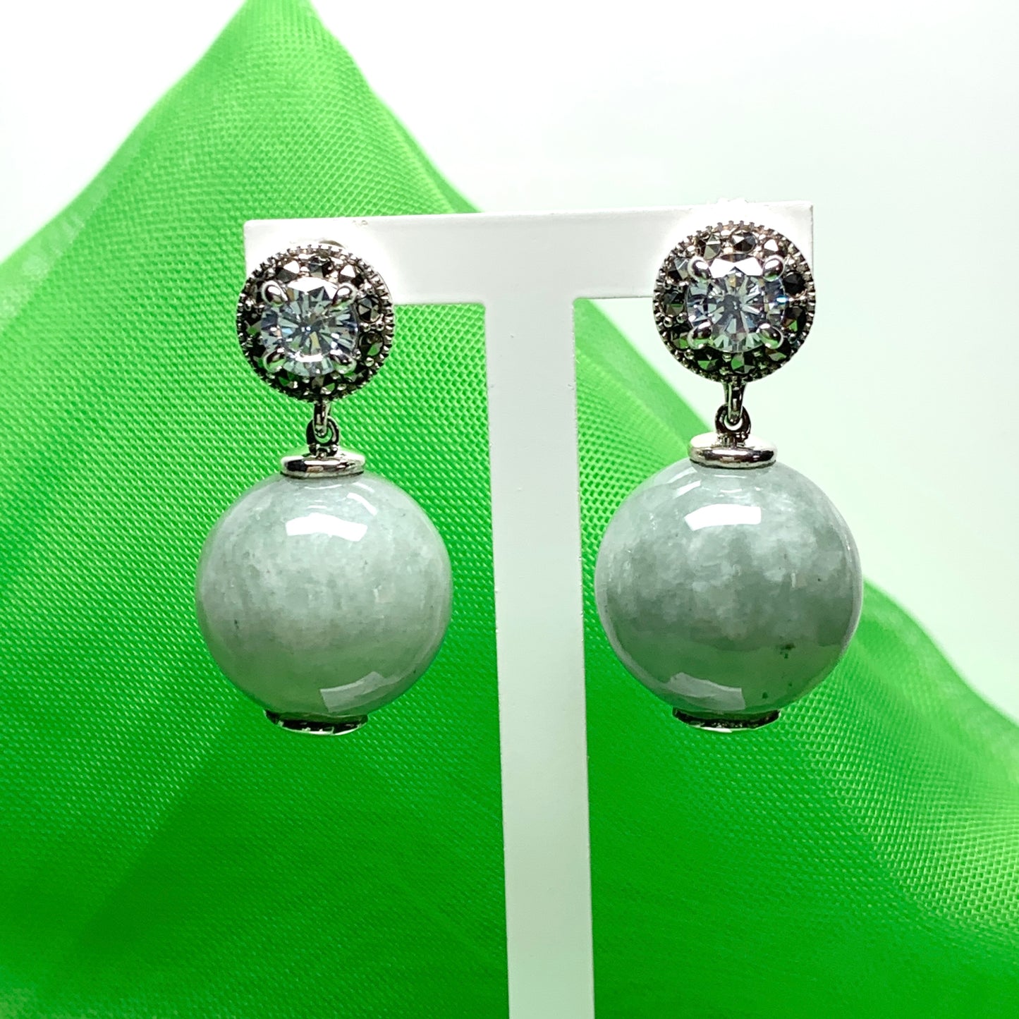 Green jade and cubic zirconia round ball shaped drop earrings