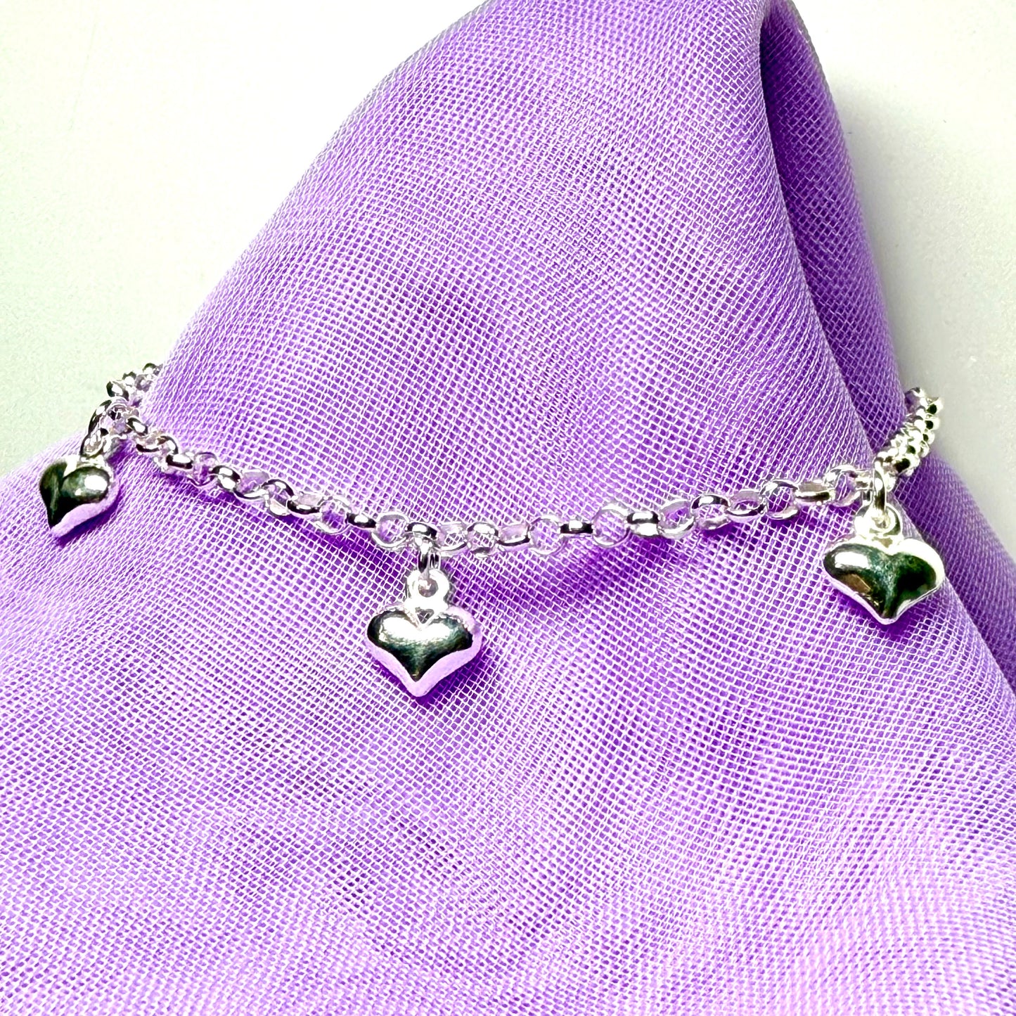 Ladies bracelet four heart shaped charms dangling sterling silver