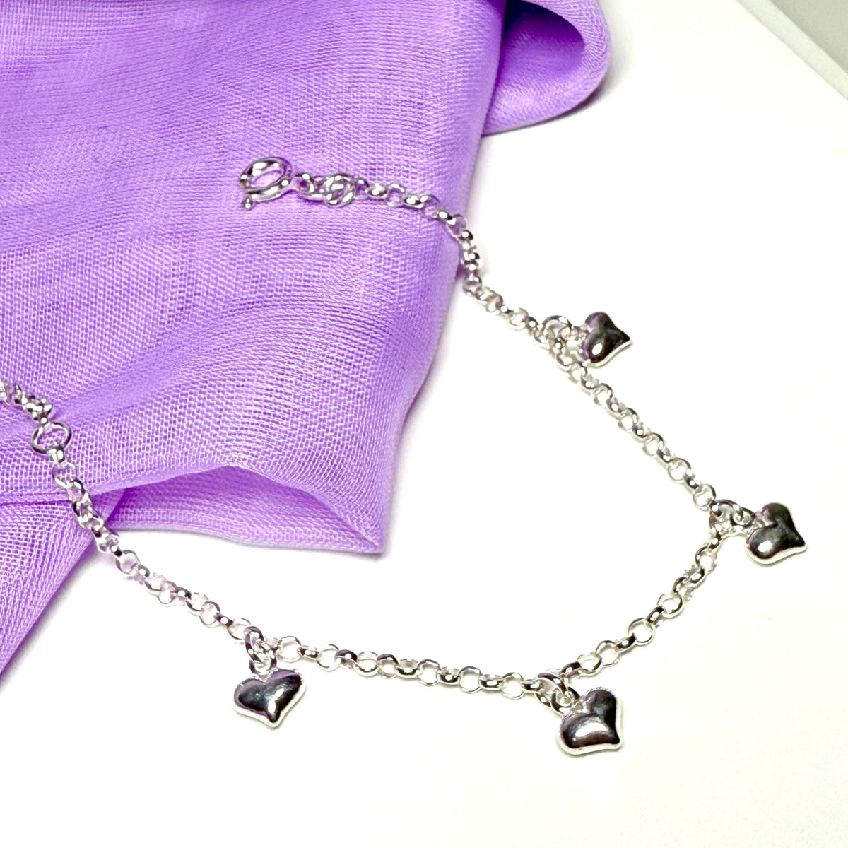 Ladies bracelet four heart shaped charms dangling sterling silver