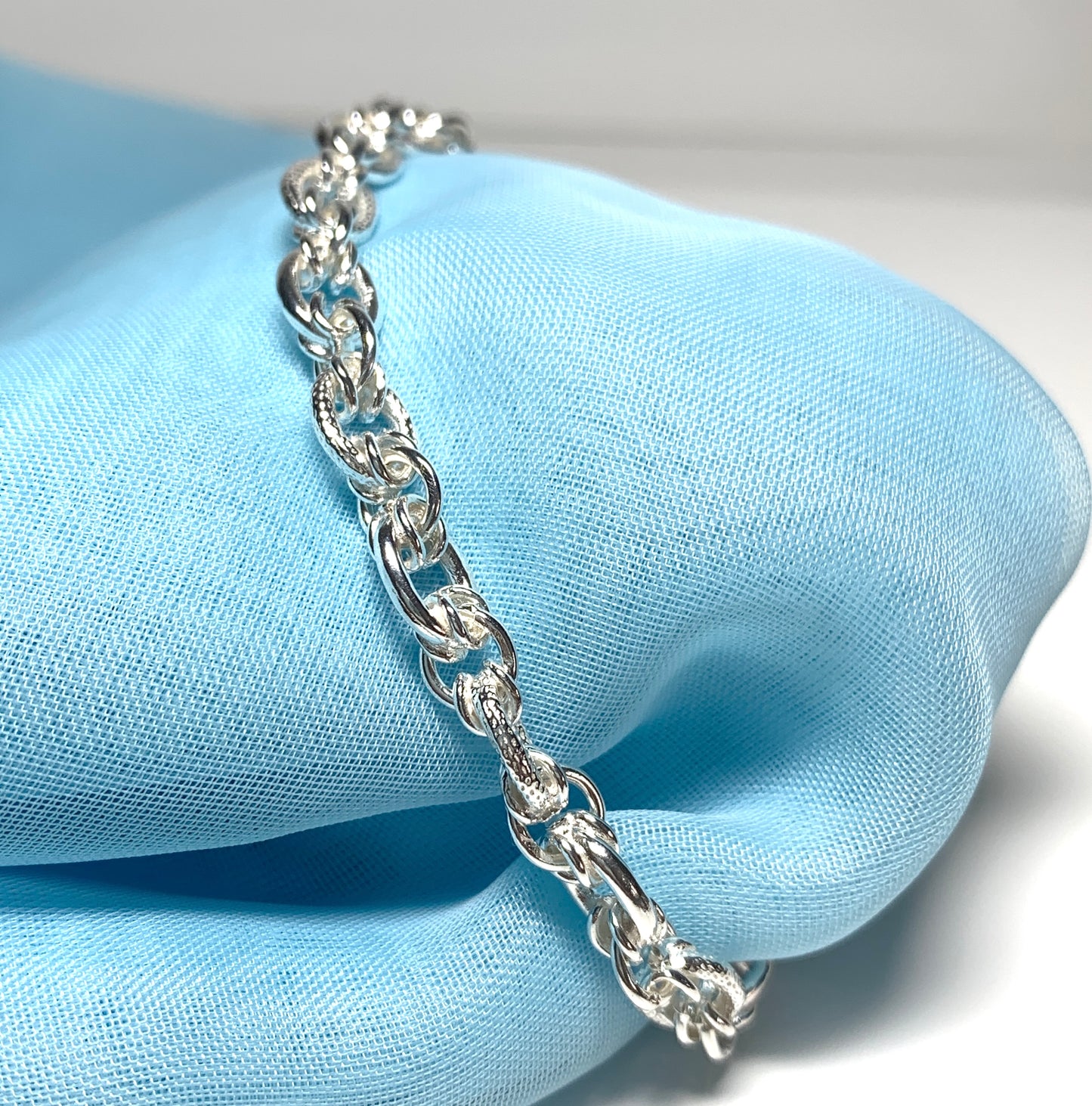 Ladies sterling silver bracelet fancy patterned solid link