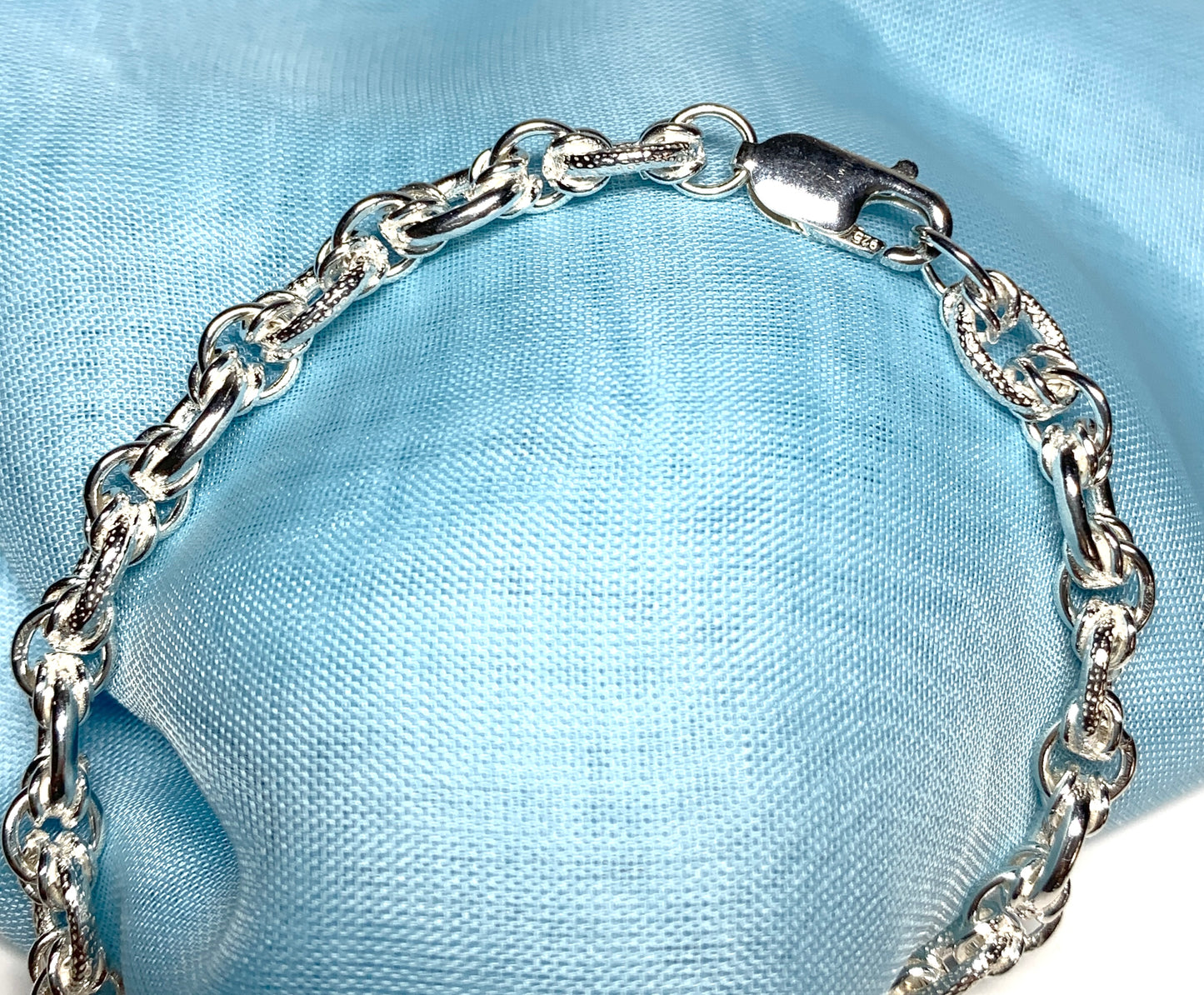 Ladies sterling silver bracelet fancy patterned solid link