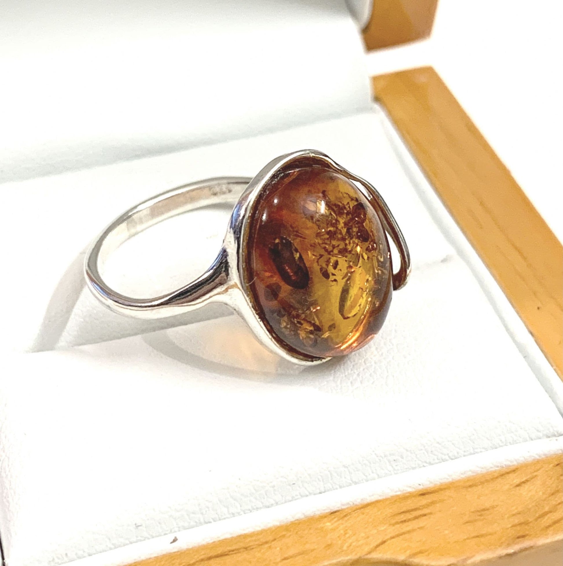 Large Oval Twisted Sterling Silver Orange Amber Ring