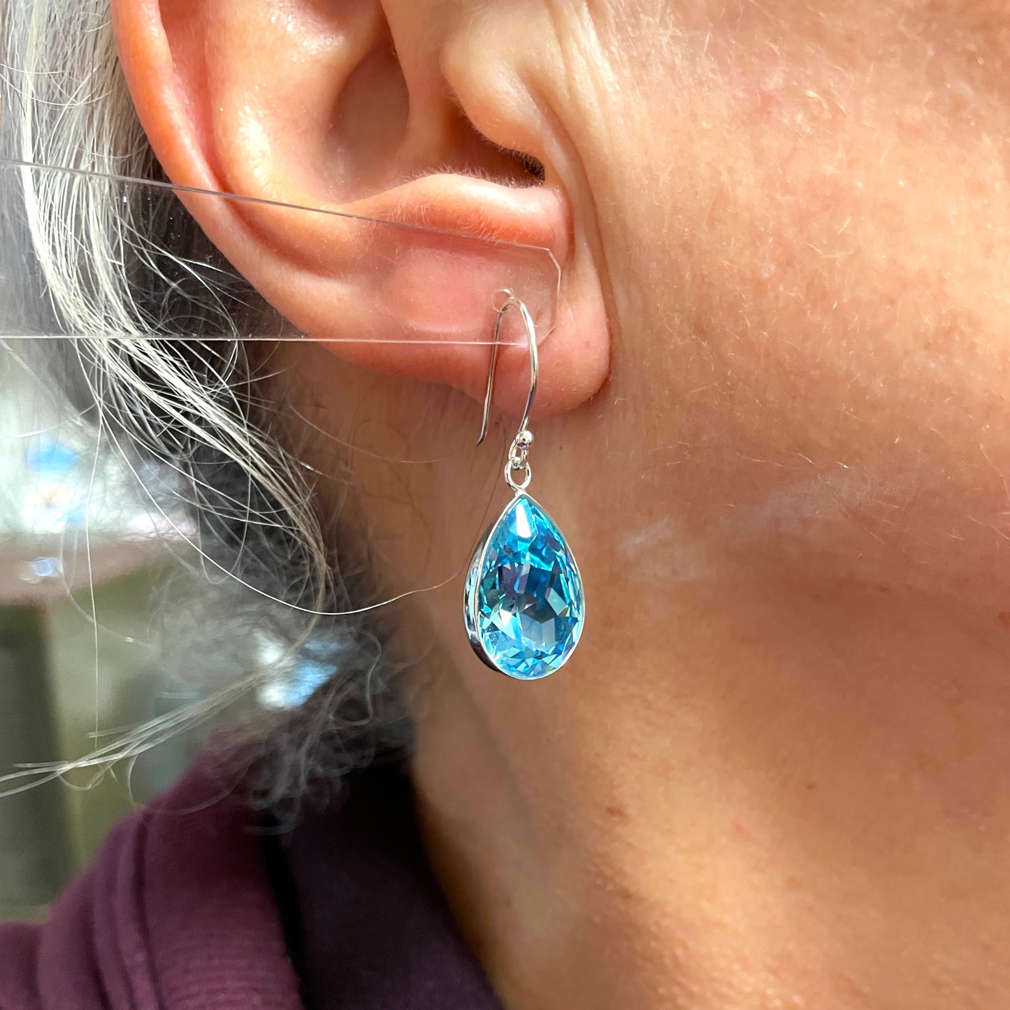 Large blue crystal pear teardrop earrings aqua in colour