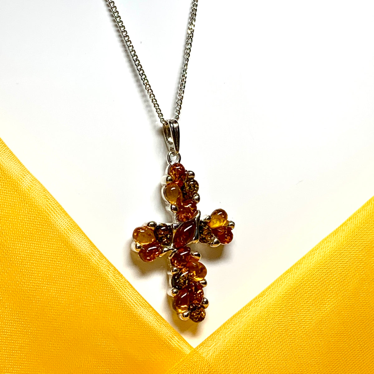 Large fancy patterned real amber cross necklace sterling silver chain included