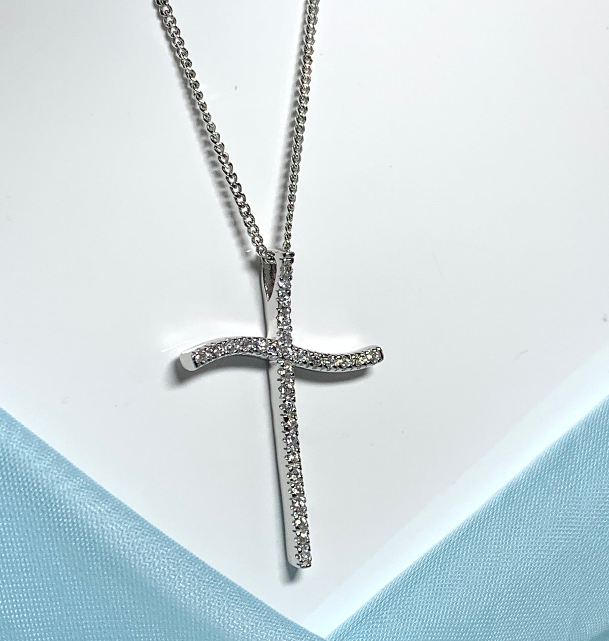 Large fancy stone set sterling silver cubic zirconia cross including chain