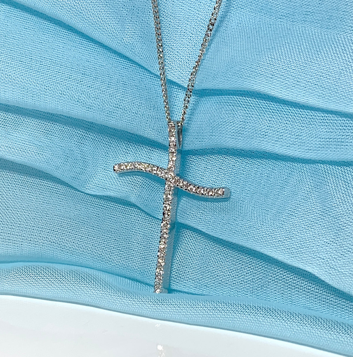Large fancy stone set sterling silver cubic zirconia cross including chain