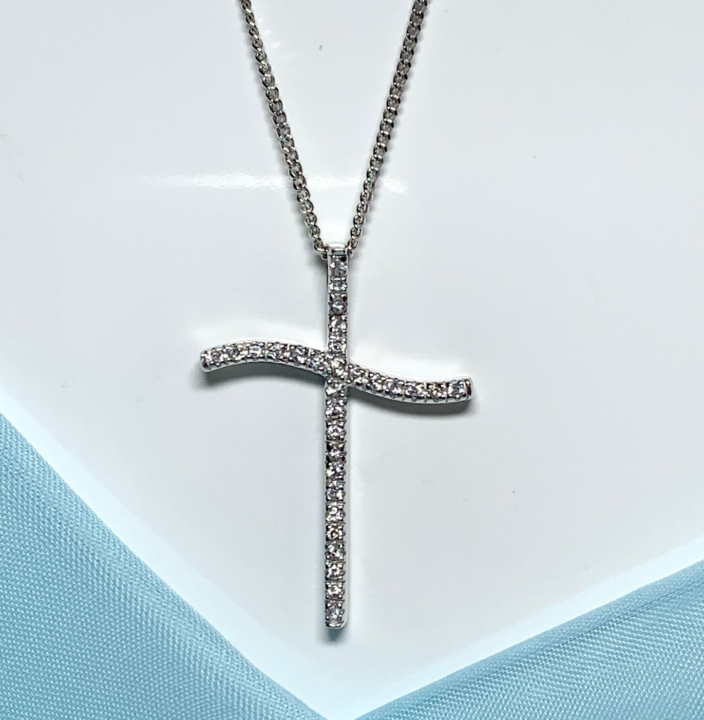Large fancy stone set sterling silver cubic zirconia cross including chain
