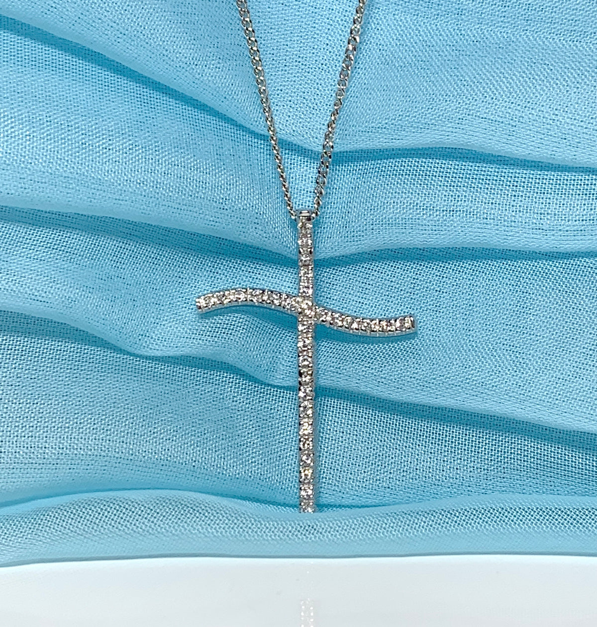 Large fancy stone set sterling silver cubic zirconia cross including chain