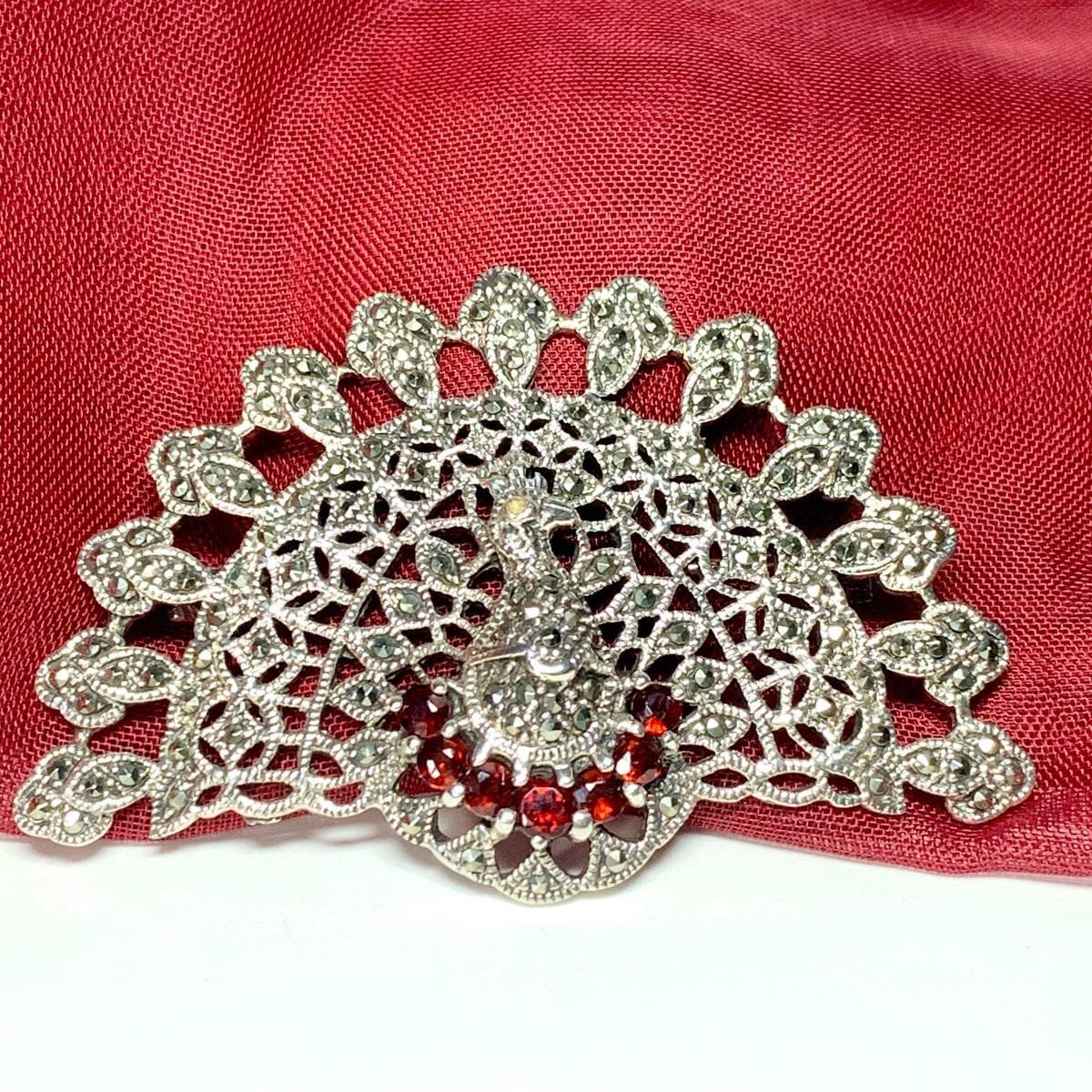 Large peacock brooch fanning it’s wings open sterling silver
