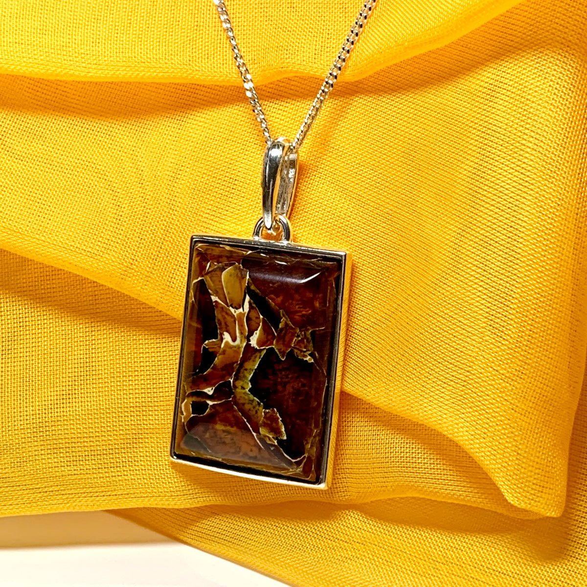 Large square rectangular ulnar shaped real amber necklace including chain