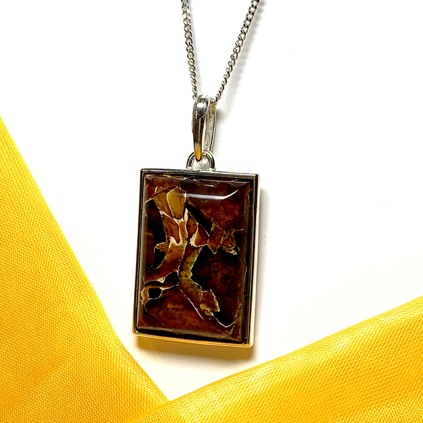 Large square rectangular ulnar shaped real amber necklace including chain