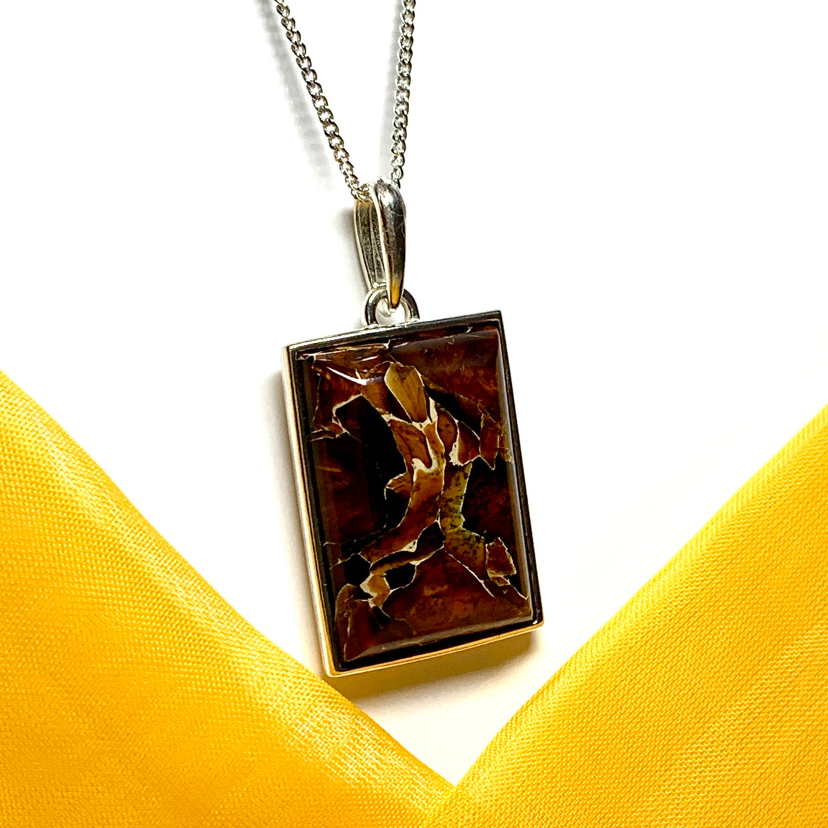 Large square rectangular ulnar shaped real amber necklace including chain