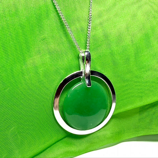 Large sterling silver round shaped green real jade necklace halo style pendant with a chain included with it