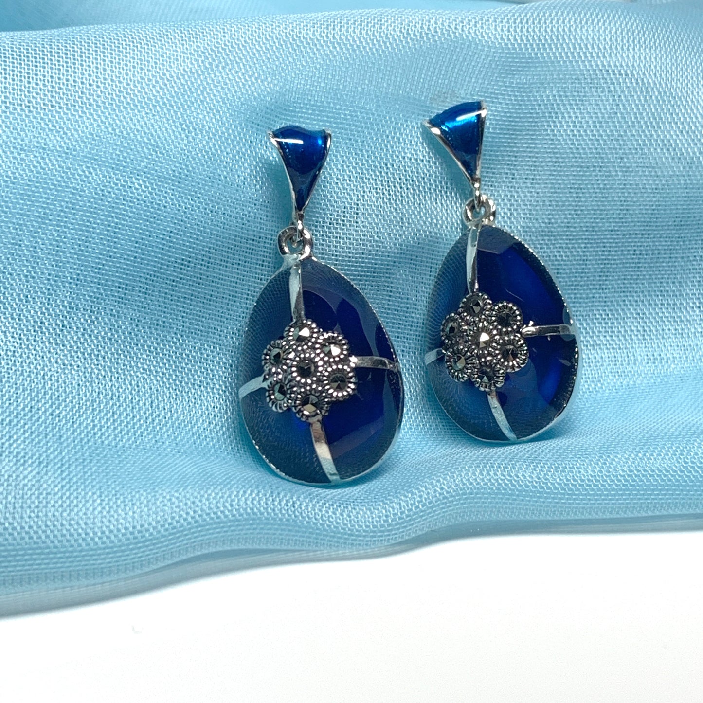 Large blue crystal drop earrings and marcasite pear teardrop