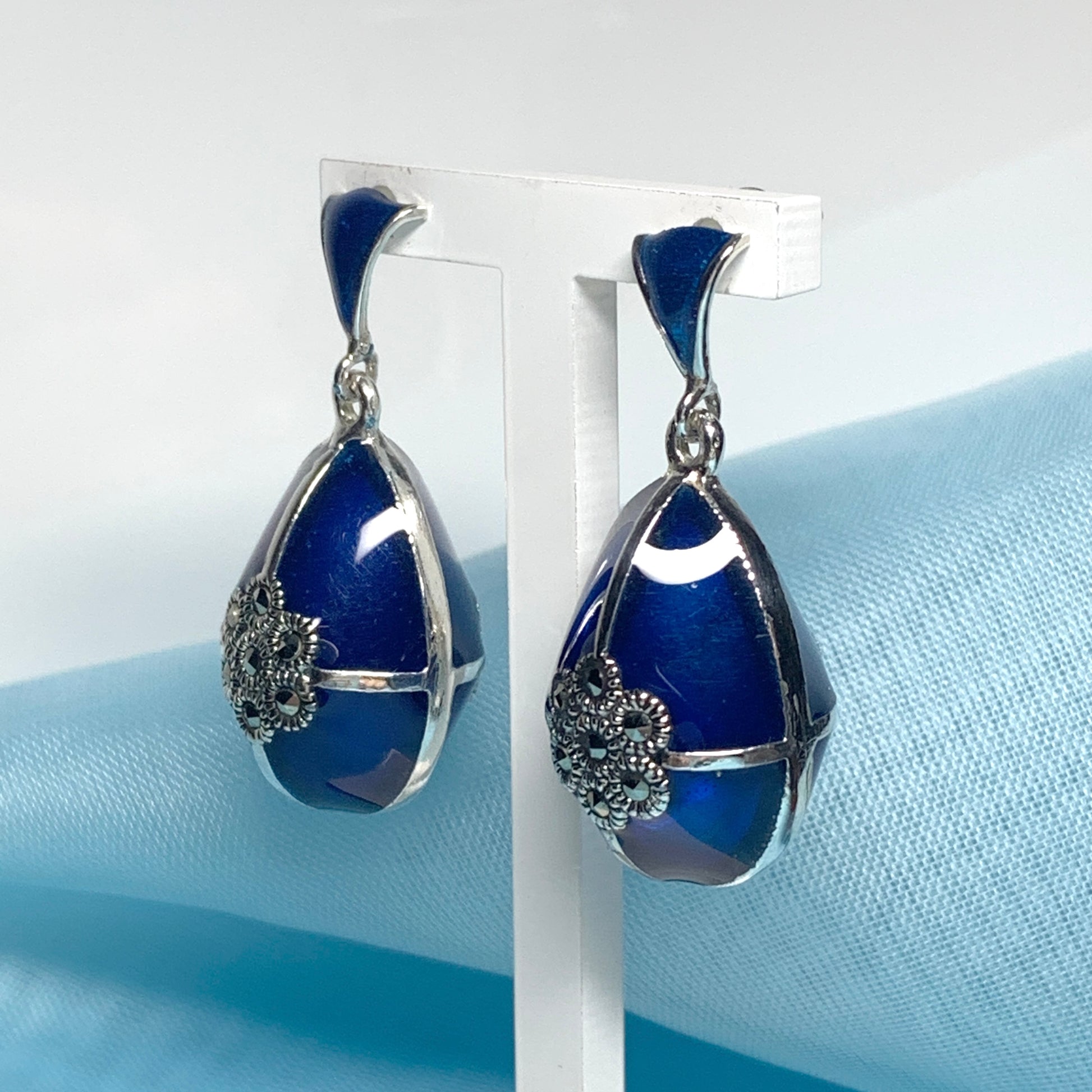 Large blue crystal drop earrings and marcasite pear teardrop