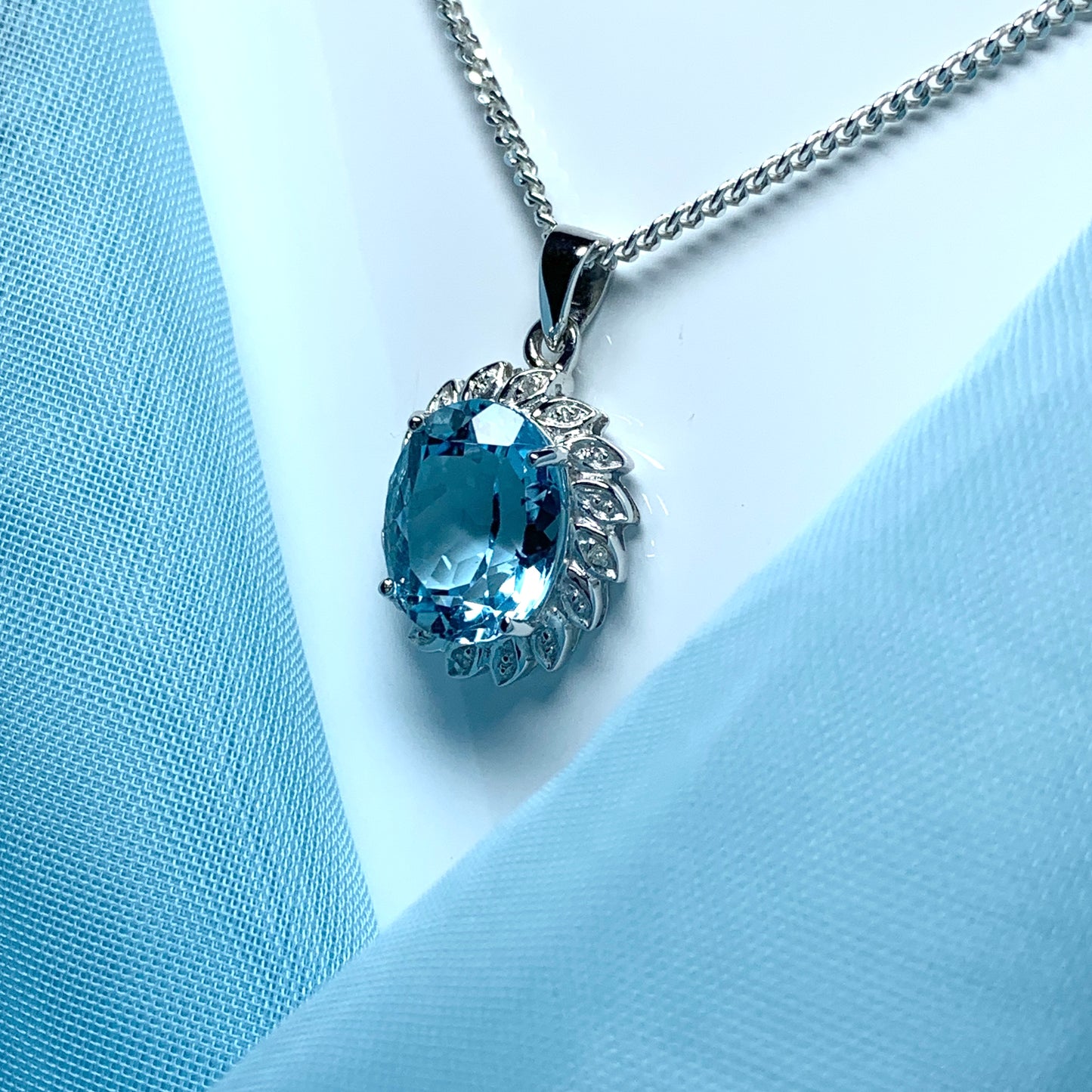 Large blue topaz and diamond sterling silver necklace