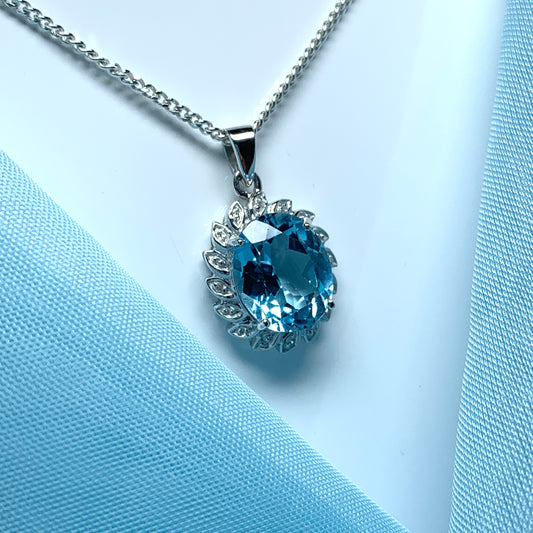 Large blue topaz and diamond sterling silver necklace